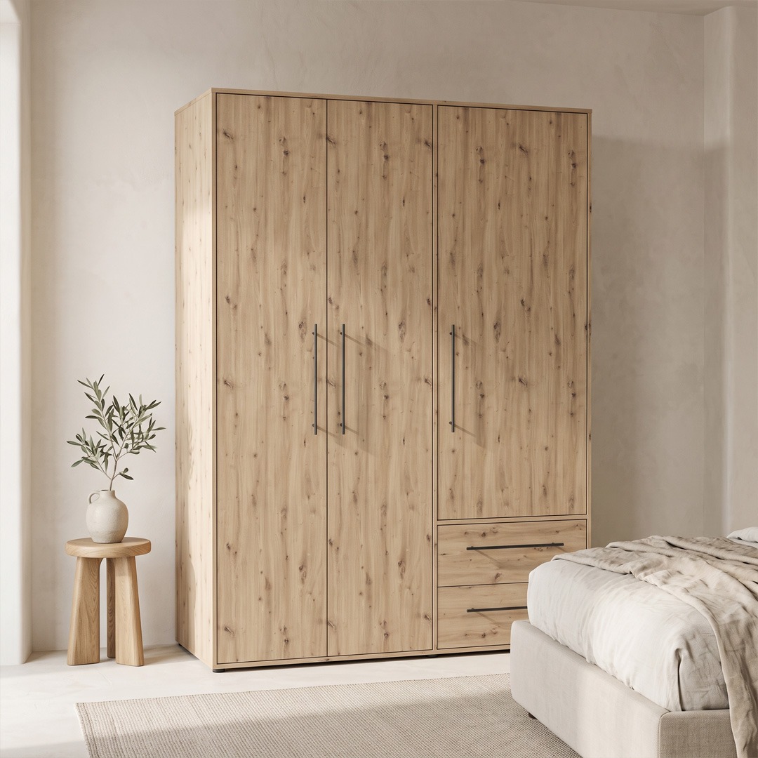 Armario de tres puertas y dos cajones efecto madera Armario de tres puertas acabado efecto madera natural con dos cajones y tiradores negros
